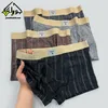 شورت نیمپا مردانه نگین برجسته نقره کوب برند لاکچری