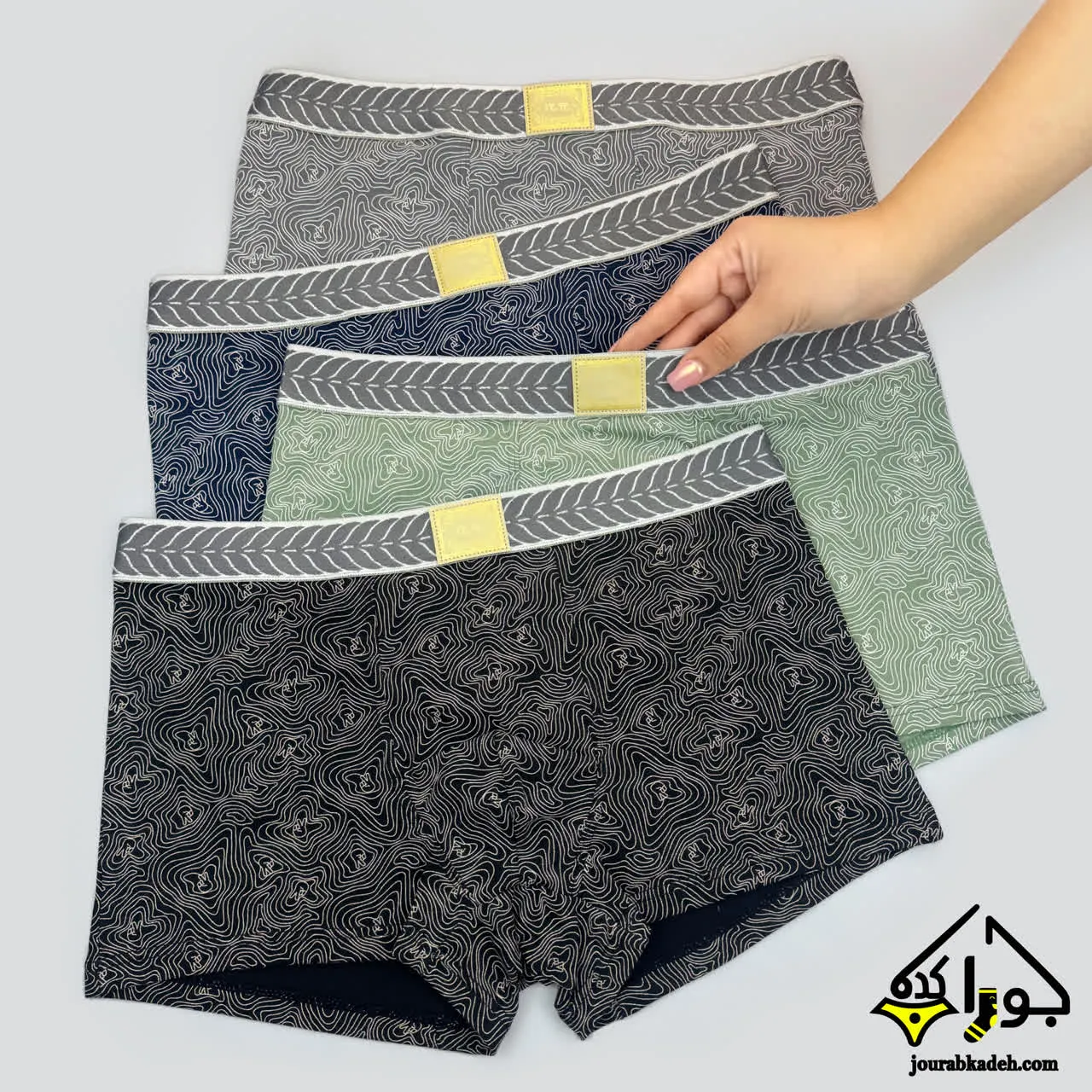 شورت نیمپا مردانه طرح مارپیچ برند لاکچری
